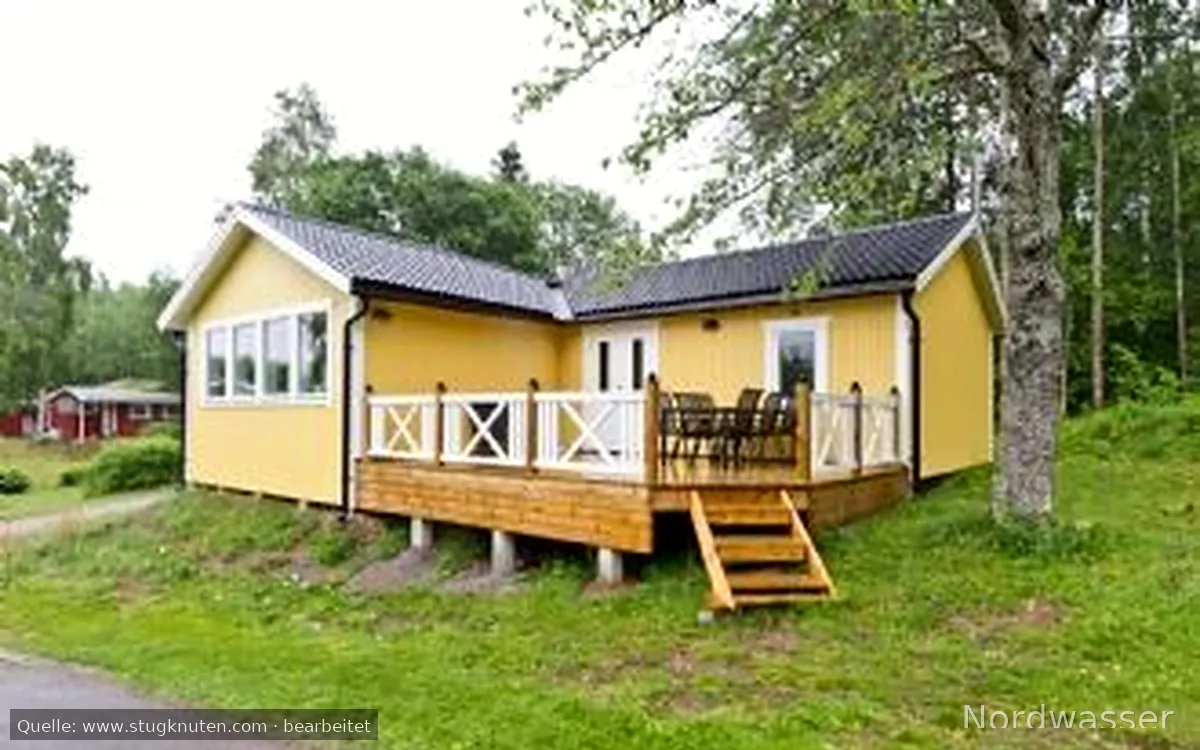 SOLSTUGAN med egen roddbåt