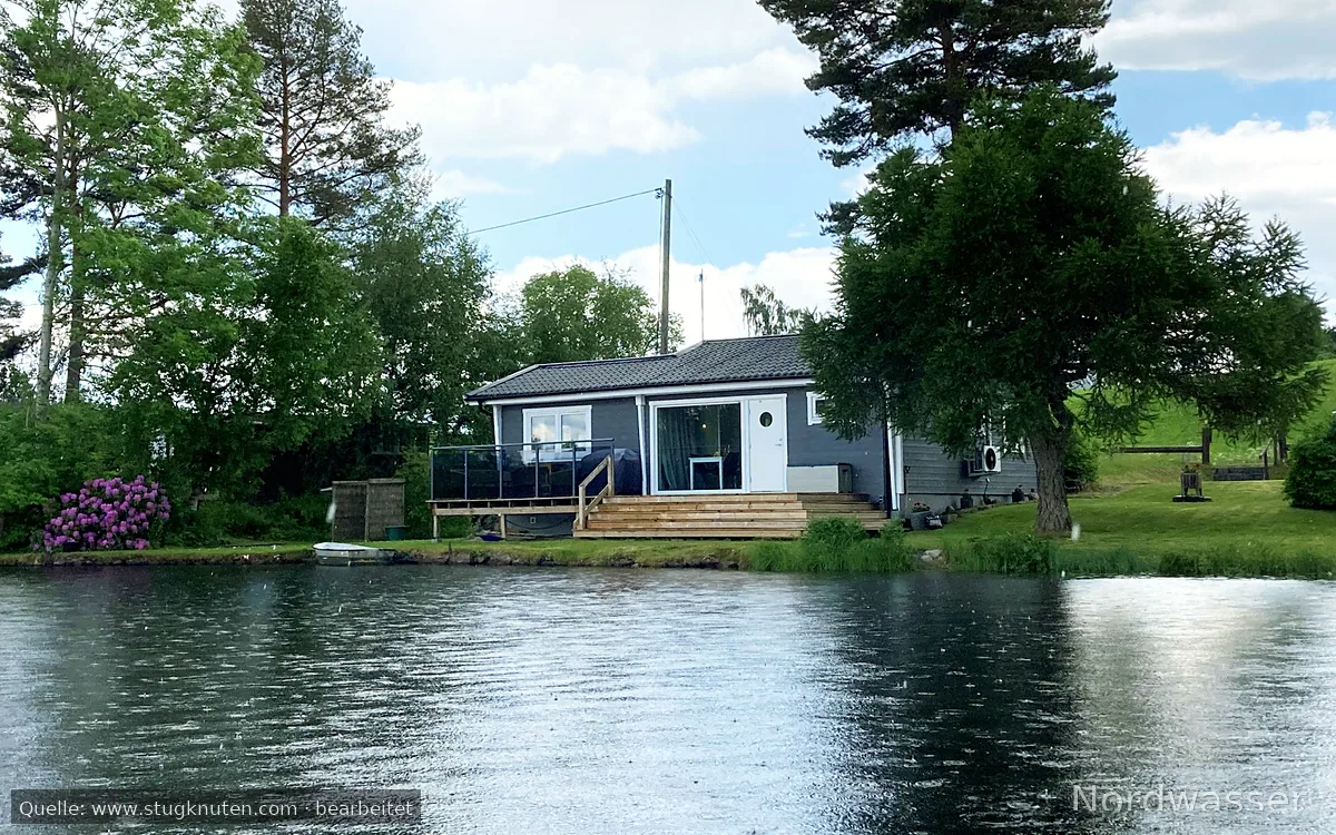 Härlig stuga med panoramautsikt över sjö| SE07027