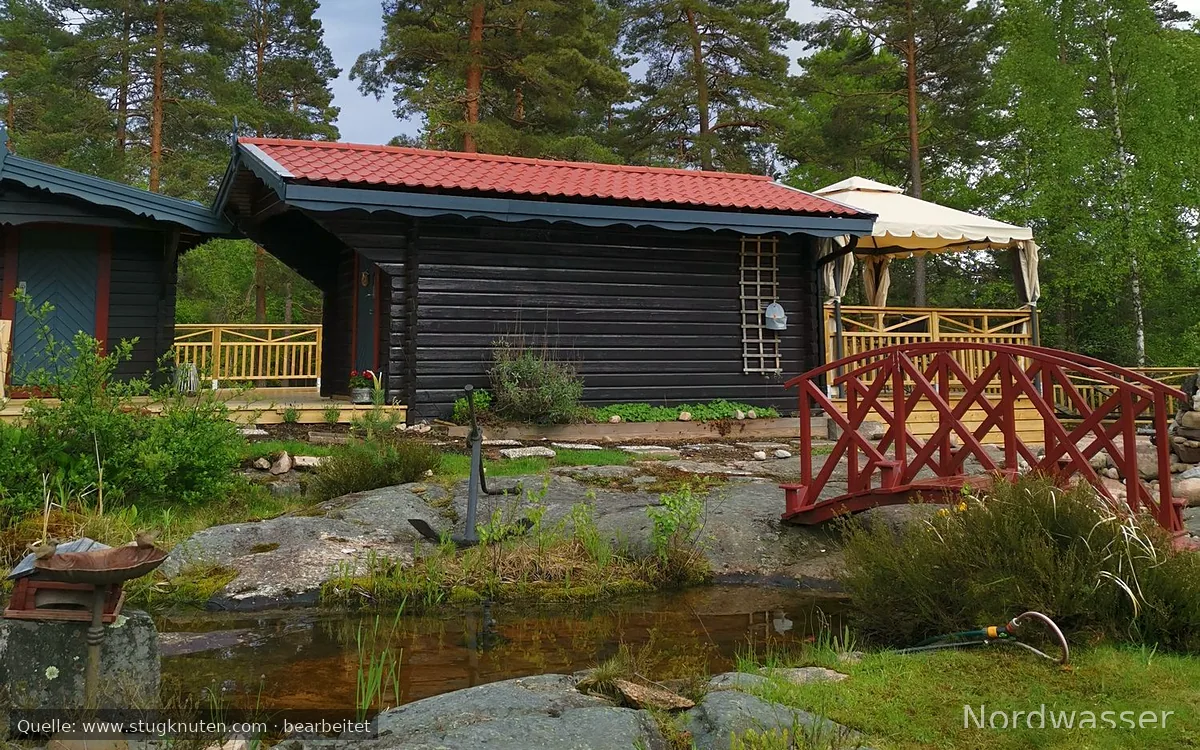 Fjällstuga i skogen nära Vänern